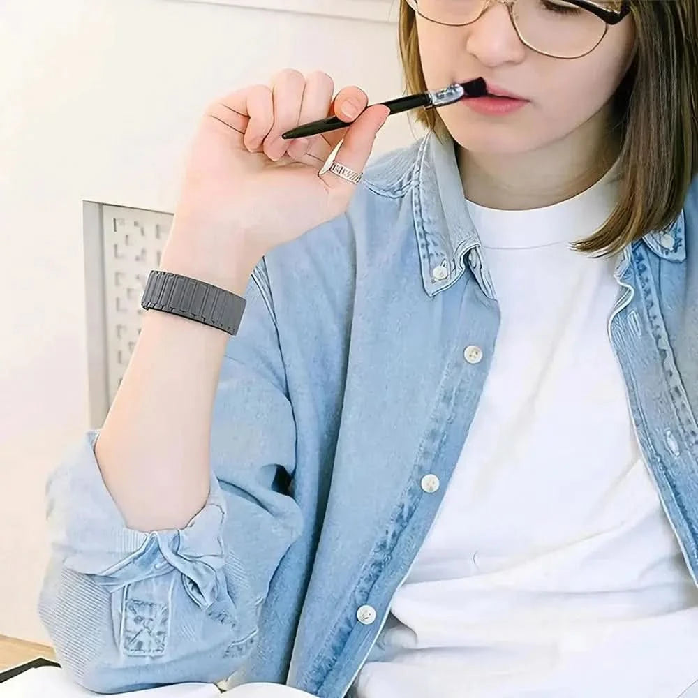Woman with glasses holding a makeup brush alongside AIFIT COLMI smartwatch with AMOLED display